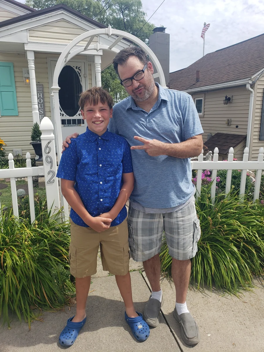 Mr Joe with Isaac, one of his piano students