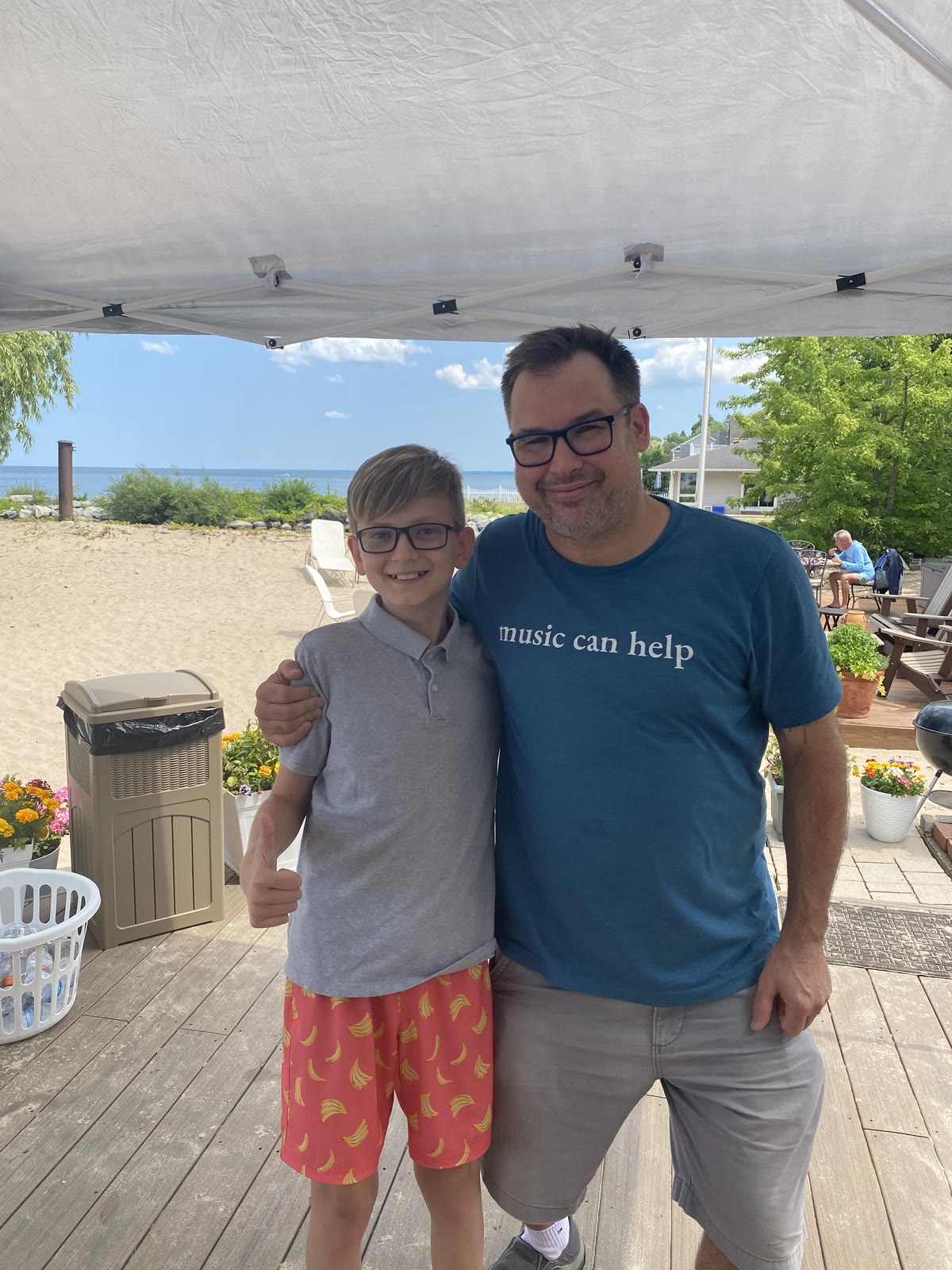 Mr Joe smiling with a piano student at the 2026 Beach Recital near Rochester, NY